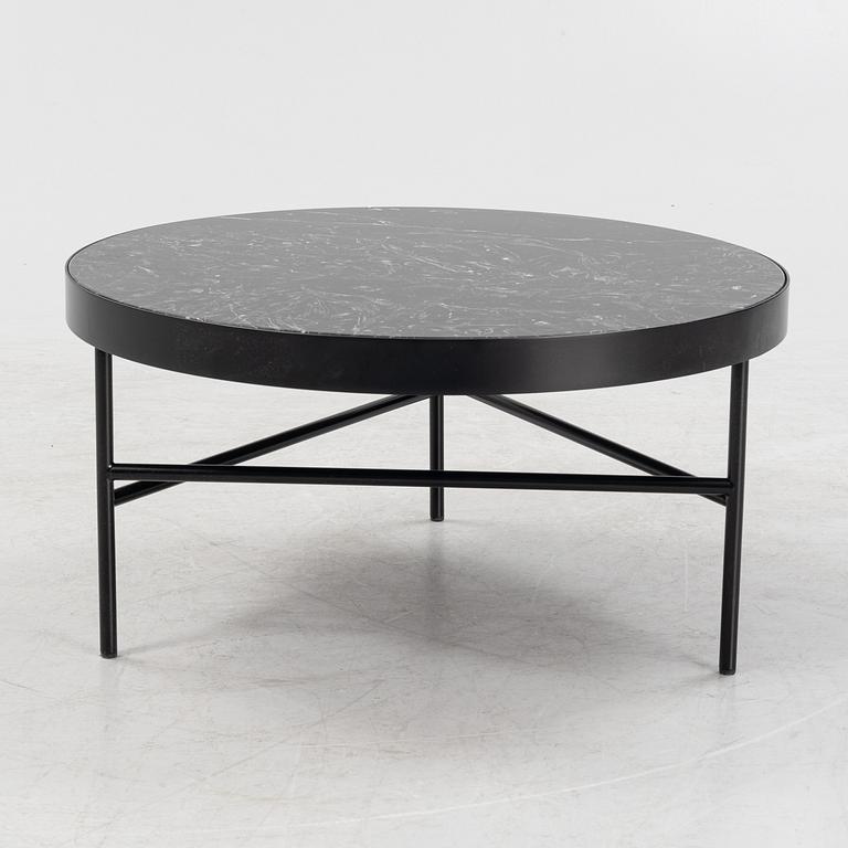 A marble top coffe table by Ferm Living, Denmark.