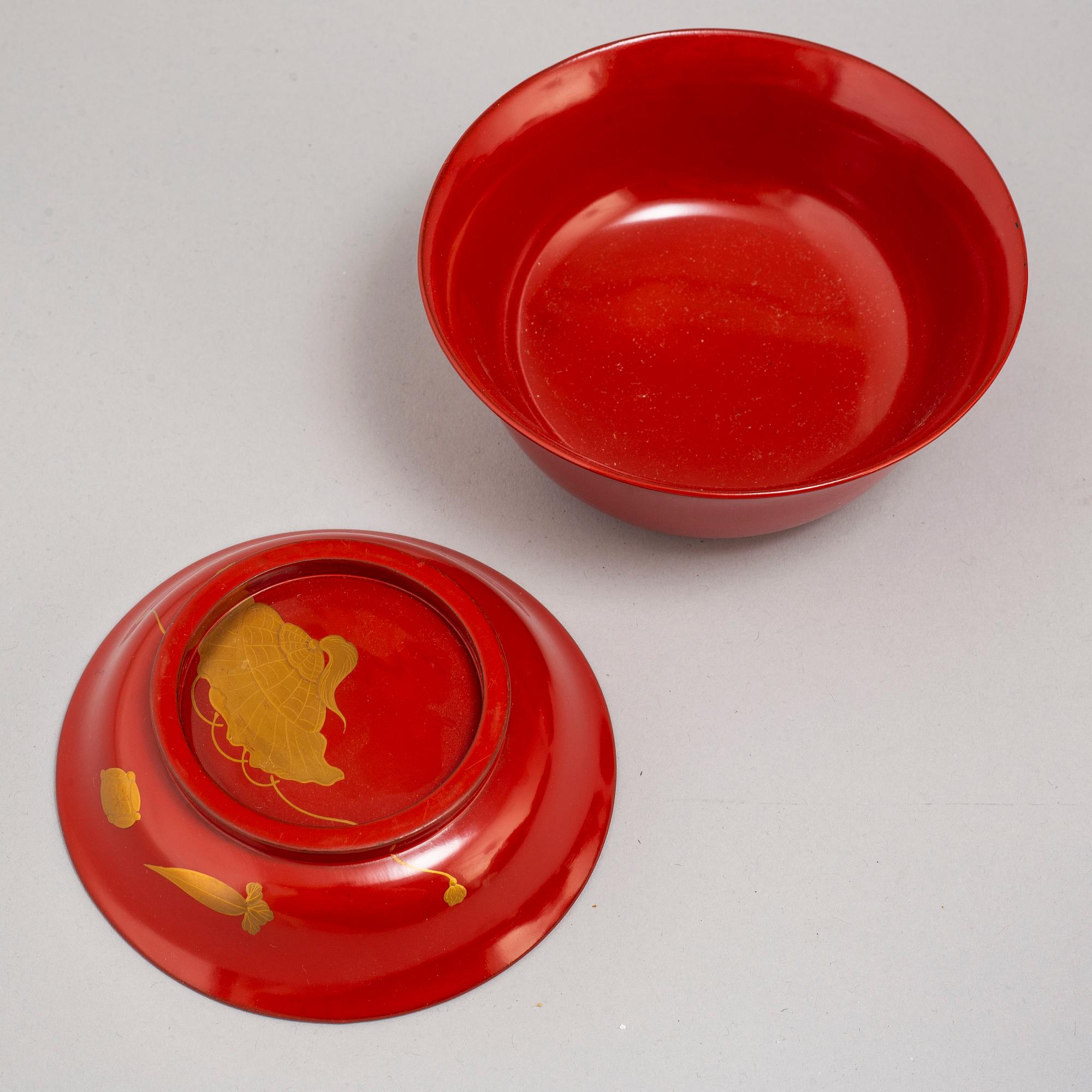 Eight lacquered bowls with covers, Japan, 20th century.