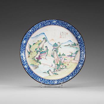 An enamel on copper serving dish, Qing dynasty, 18th Century. With an inscription.