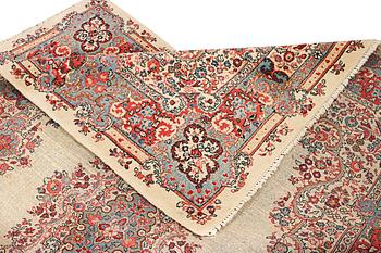 A Kerman carpet, c. 270 x 187 cm.