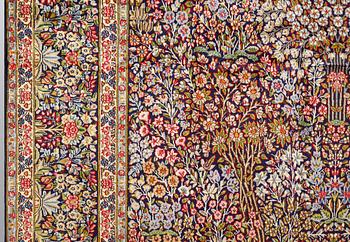 A Kirman Laver carpet, 'Millefleur', approx. 400 x 295 cm.