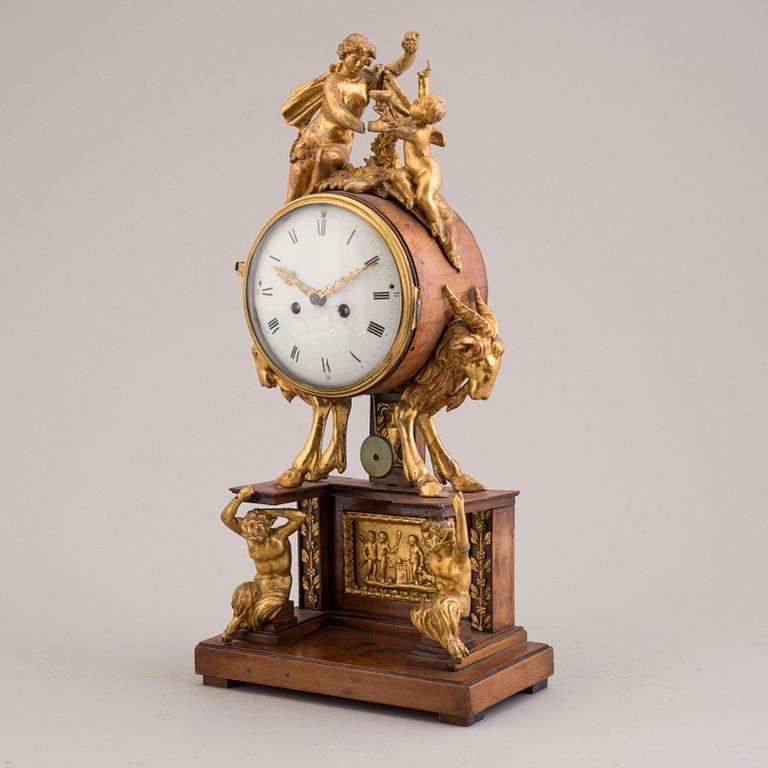 A PENDULUM CLOCK, first half of the 19th century.