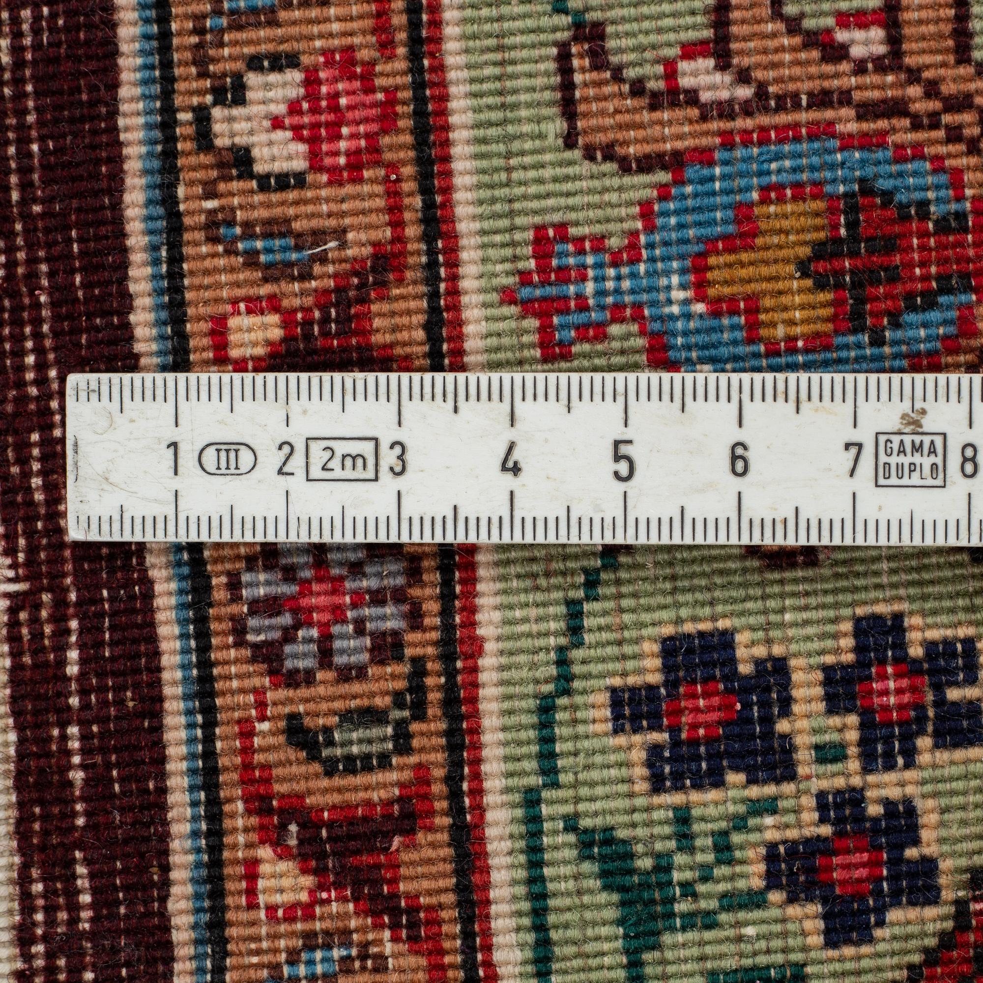 A carpet, Old Tabis, Part silk, ca 292 x 190 cm.