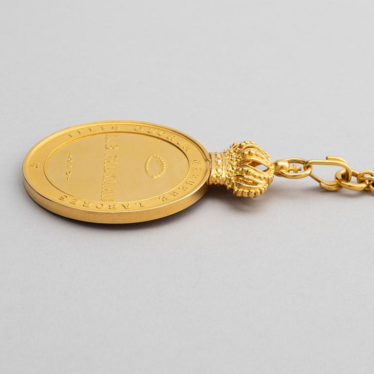 The Royal Illis Quorum medal in gold with chain awarded to Ludvig Berckhan Falkman.