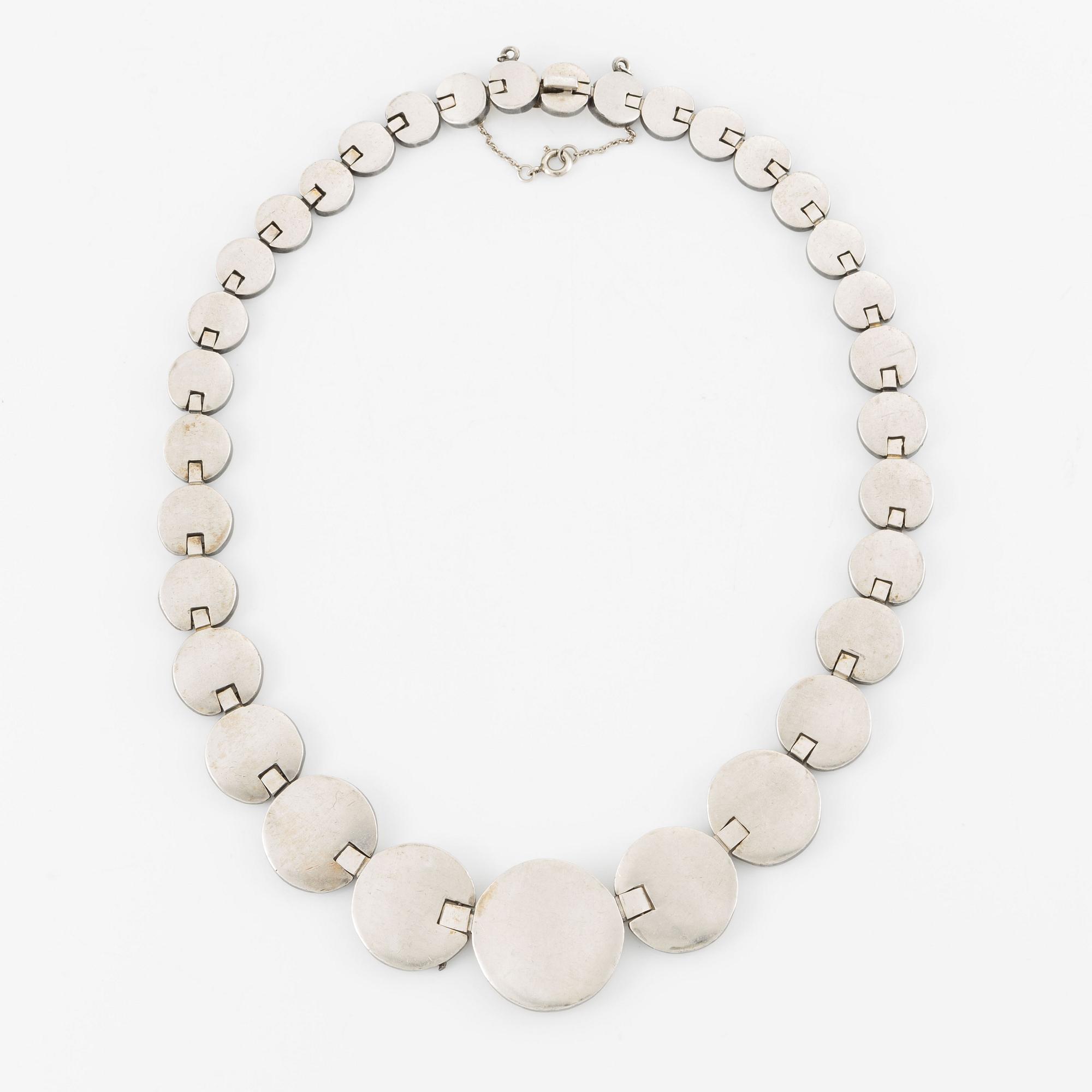 A silver necklace.