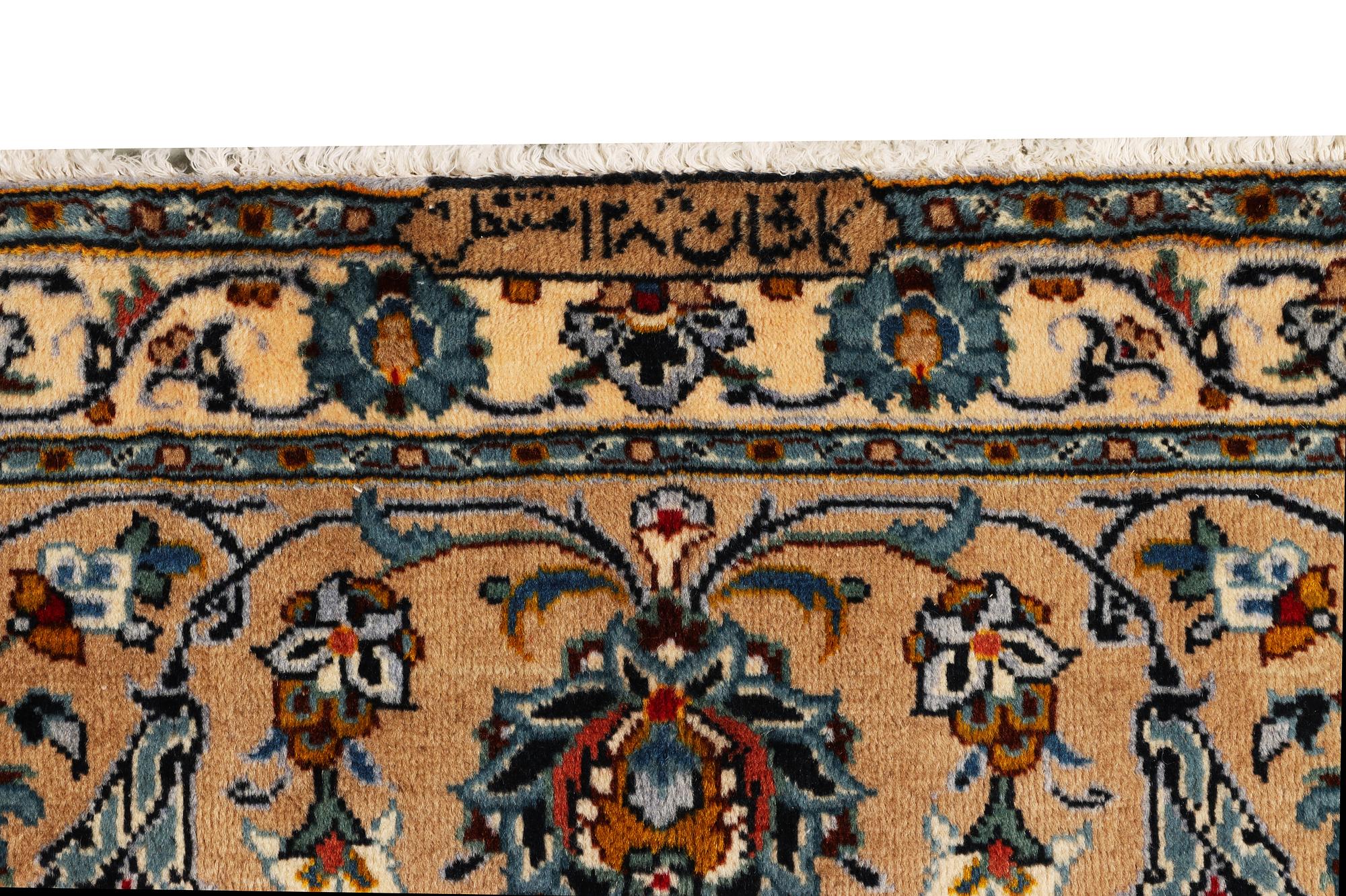 A Kashan carpet, c. 380 x 276 cm.