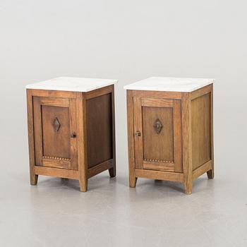 A PAIR OF BEDSIDE TABLES.