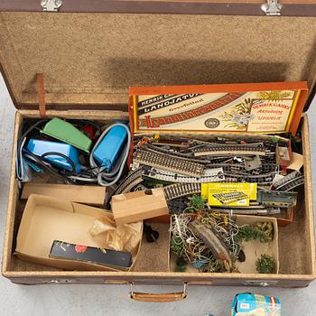 Märklin, among others, collection of locomotives, carriages, and accessories, 1950s-60s.