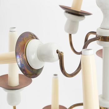 A painted wood and brass model 2586 candelabra by Josef Frank for Firma Svenskt Tenn.