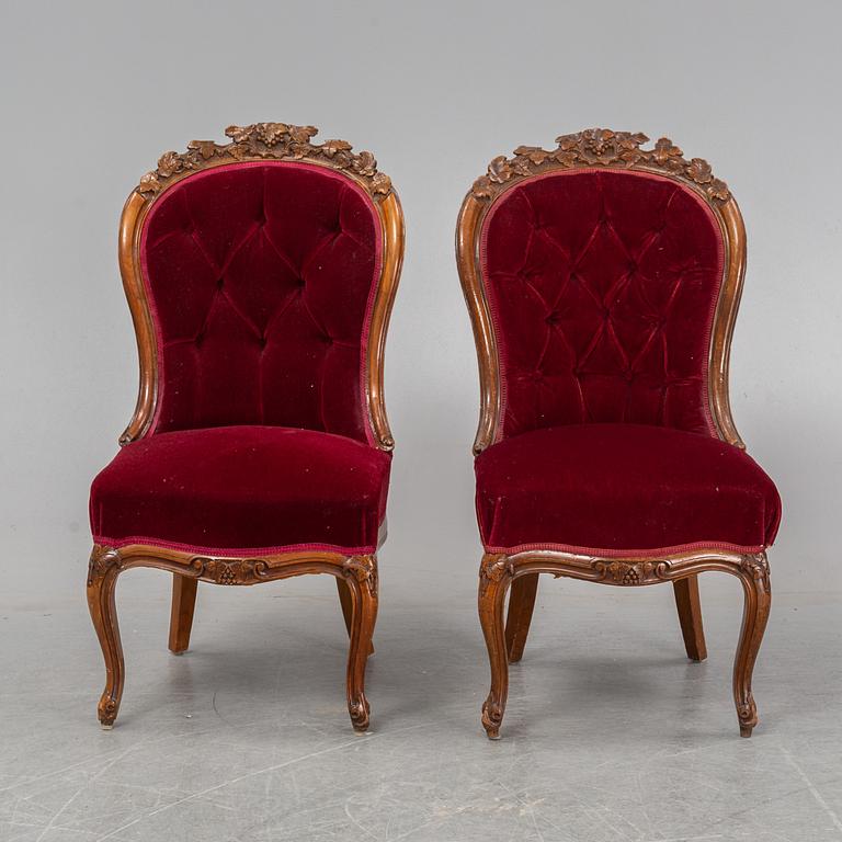 A pair of mahogany Neo-Rococo easy chairs, late 19th Century.