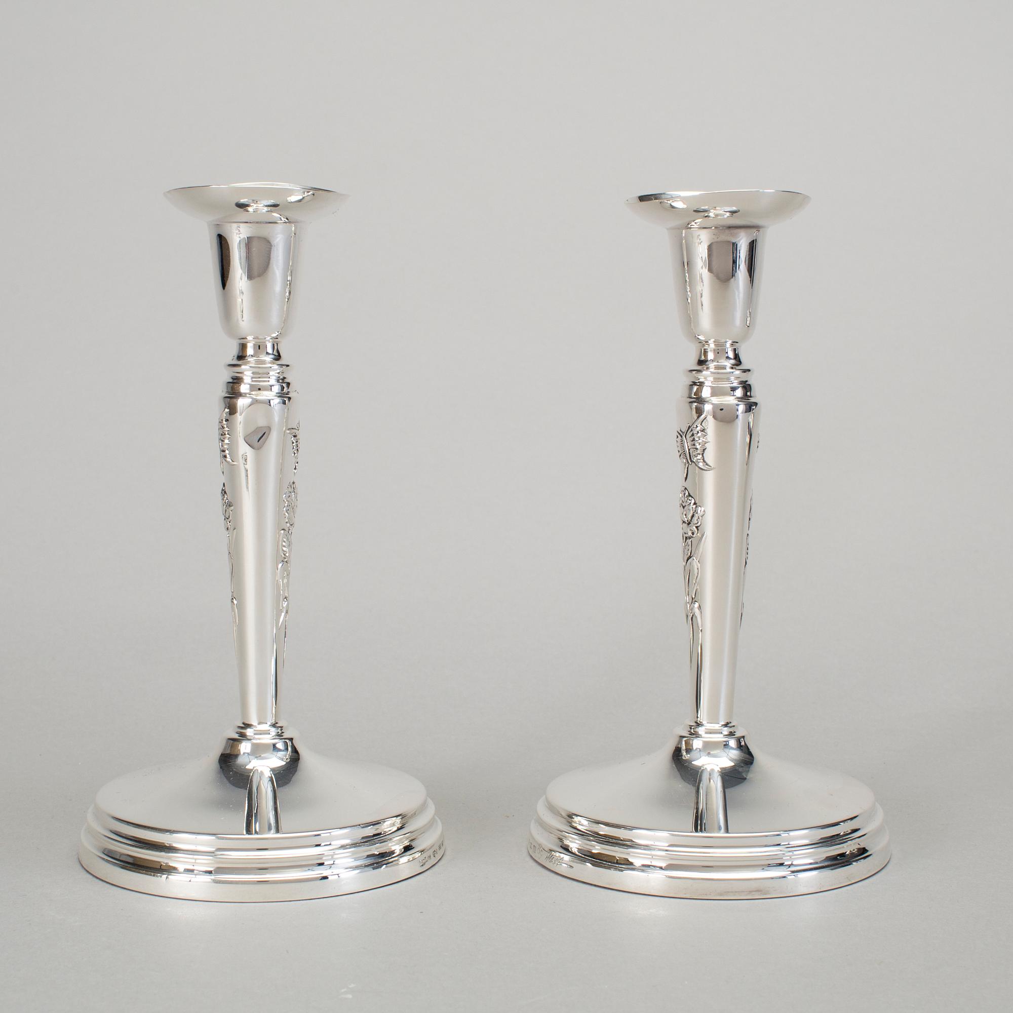 A pair of silver candlesticks by Meya Lerible for Mema, Linköping 1994.