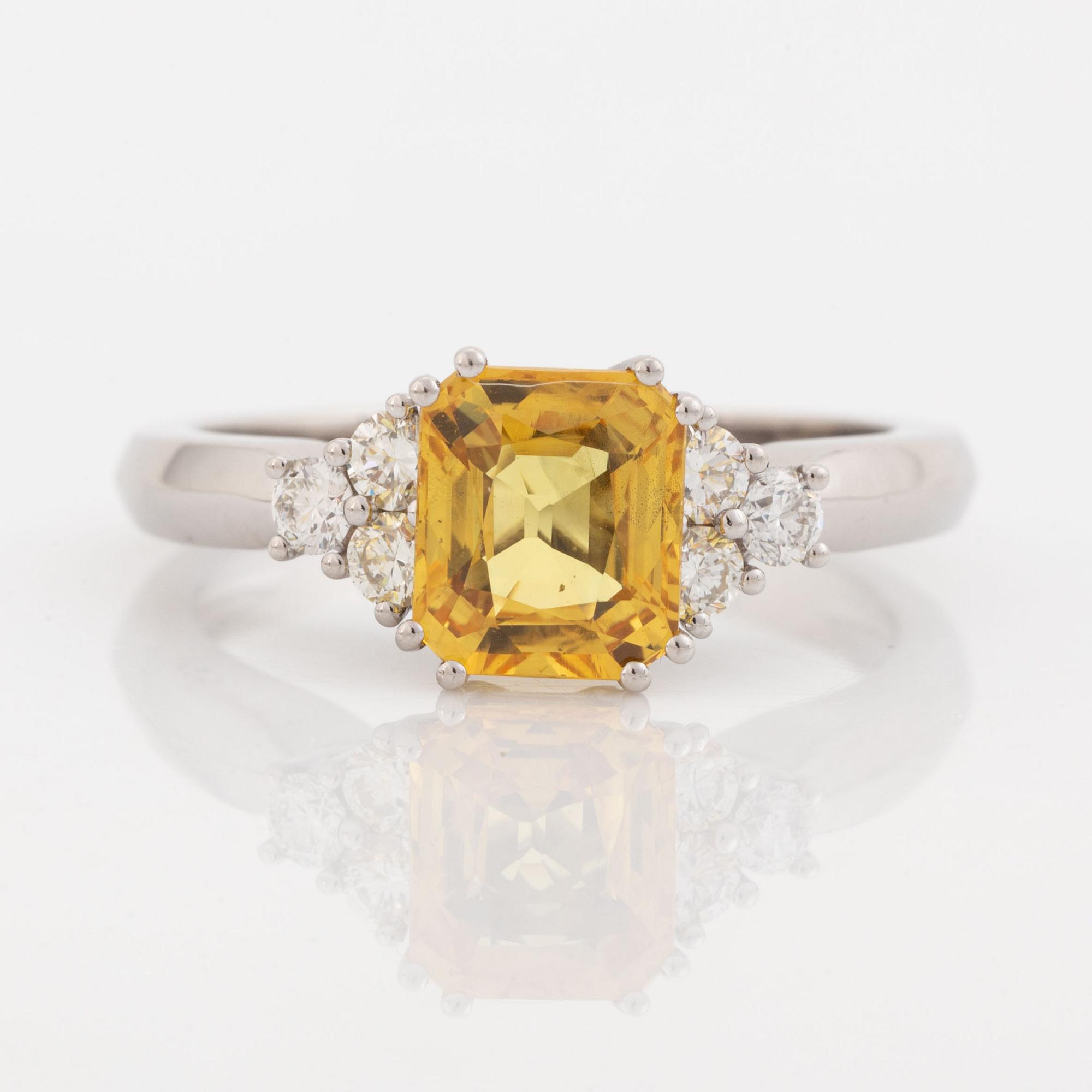 Yellow sapphire and diamond ring.