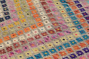 a carpet, kilim, around 293 x 226 cm.