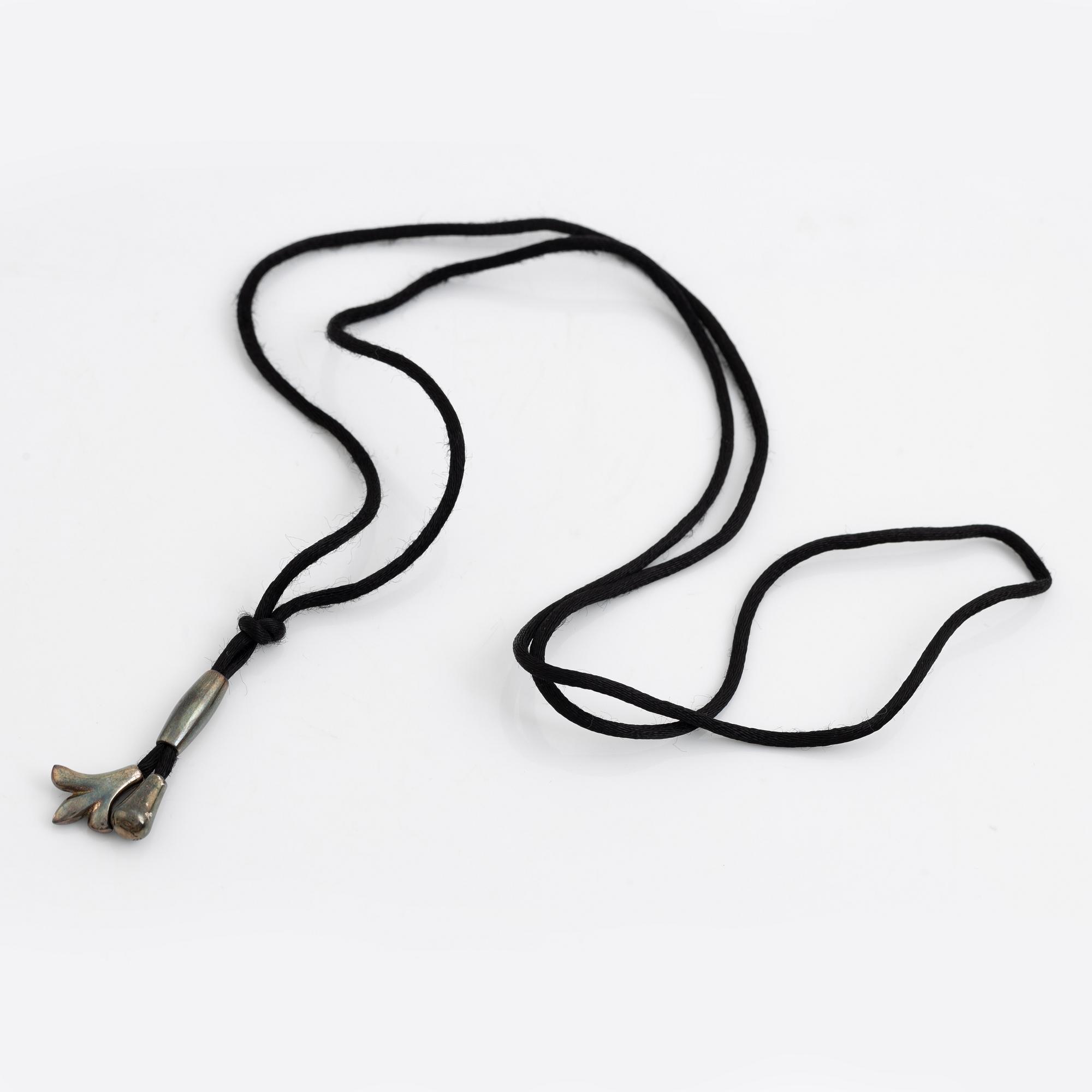 Ole Lynggaard, pendant, silver, with textile.