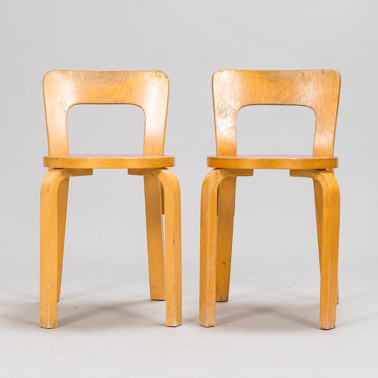 Alvar Aalto, a mid 20th century 'DL85' folding table, seven chairs for Artek.