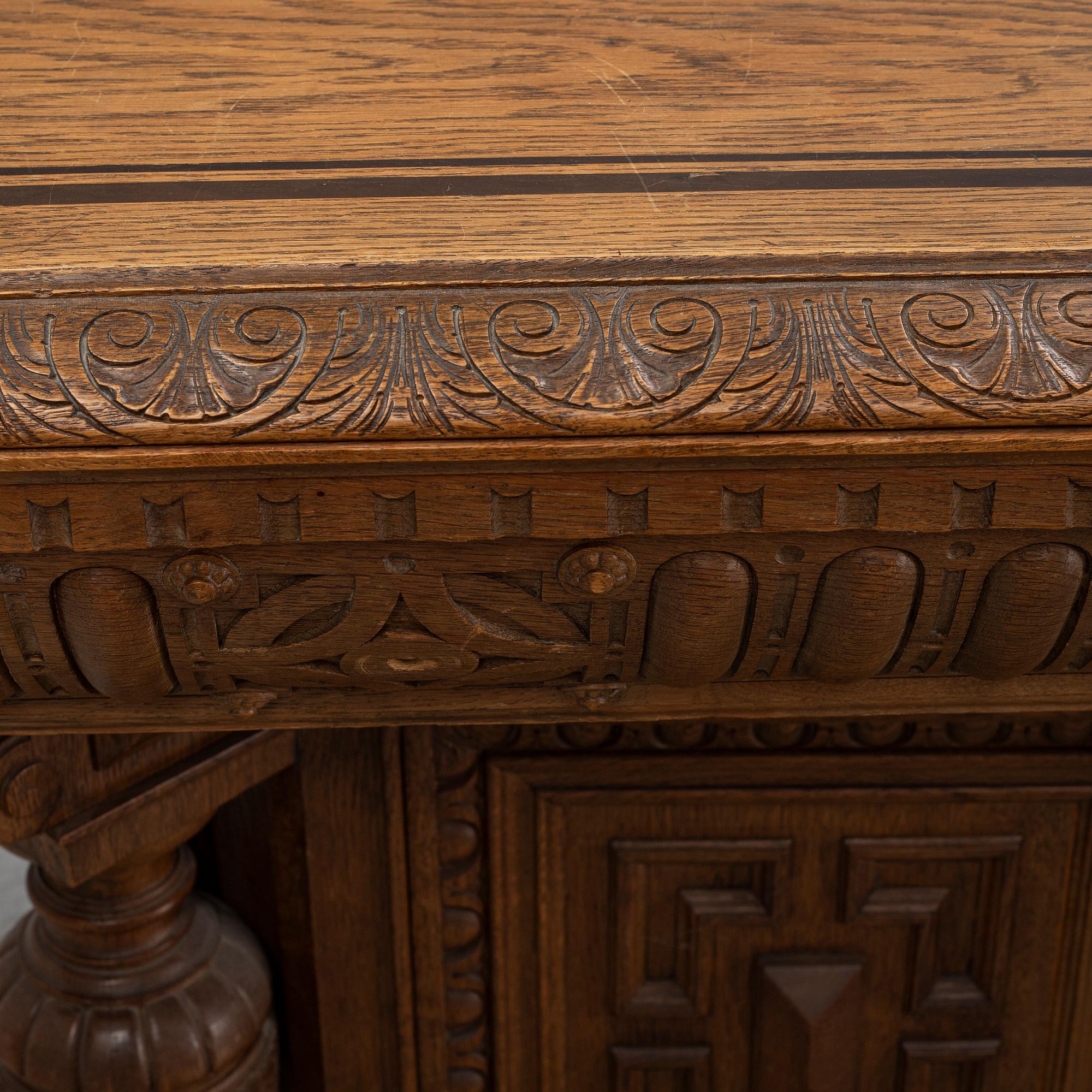 An oak library table, 1890's.