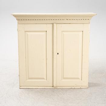 A Gustavian cabinet from around the year 1900.