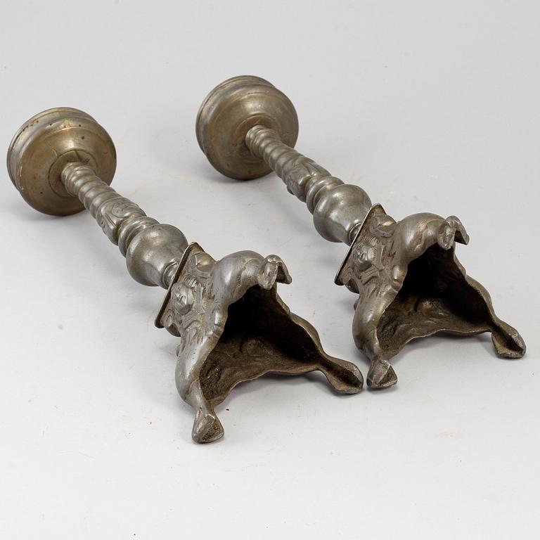 A pair of 17th century pewter candlesticks.