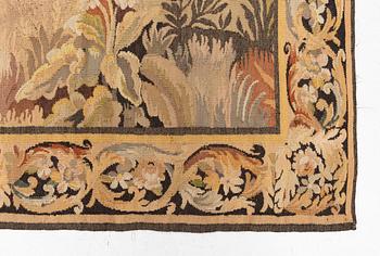 A European 'verdur' tapestry, c. 297 x 290 cm, 17th century.