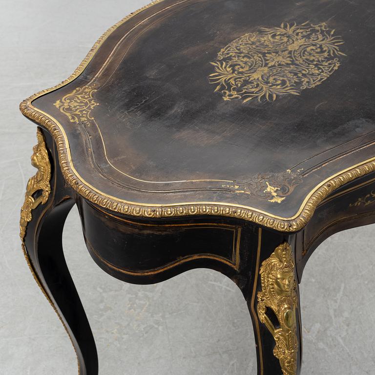 A Louis XV style table, early 20th Century.