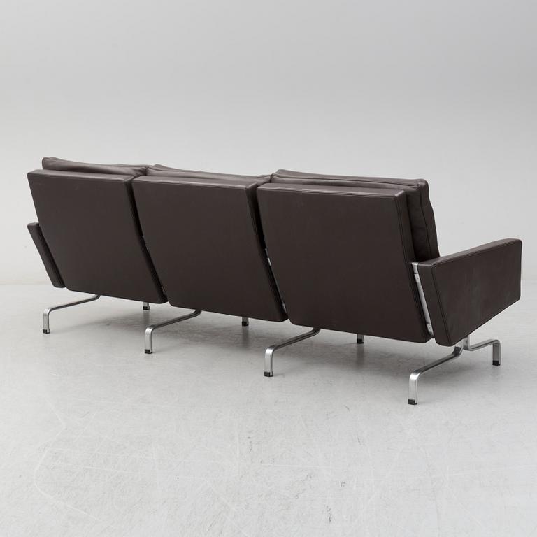 POUL KJAERHOLM, a leather 'PK 31-3' sofa, Fritz Hansen.