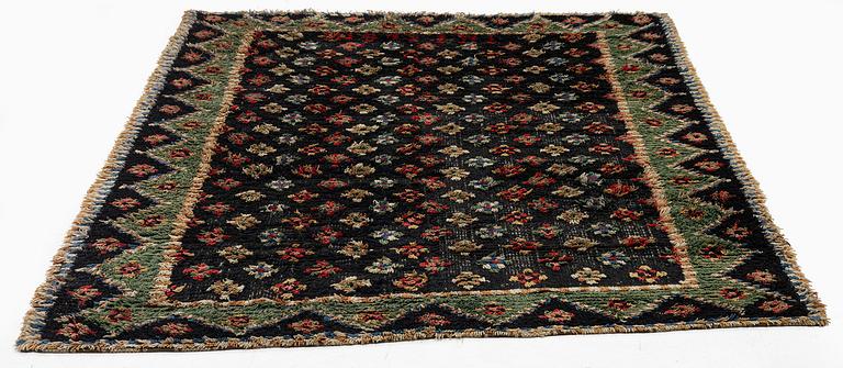 A Knotted pile (rya), c. 200 x 140 cm, Finland, dated 1849.
