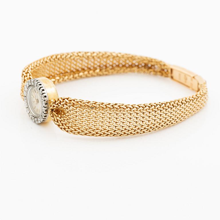 Piaget, armbandsur 18K guld och runda briljantslipade diamanter med länk av W.A. Bolin.