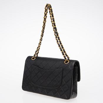 A Black Double Flap Bag.