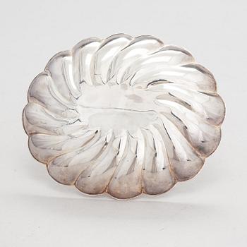 A scalloped silver dish, Pasgorcy, Madrid, Spain, after 1934.