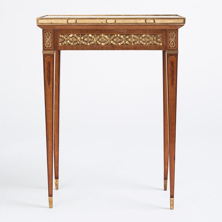 A Gustavian marquetry, ormolu-mounted, and marble table by G. Iwersson (master in Stockholm 1778-1813), signed 1781.