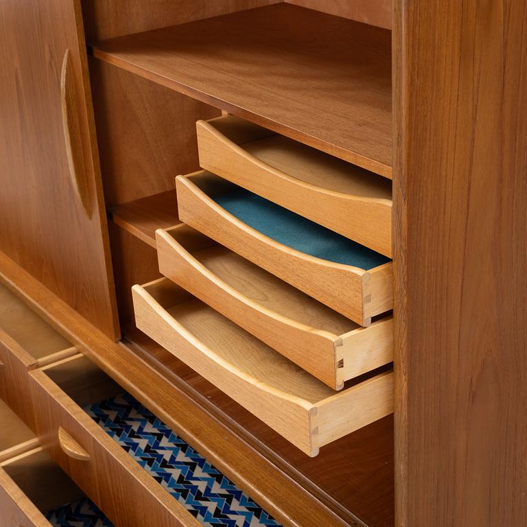 A teak veneered cabinet, 1960s.