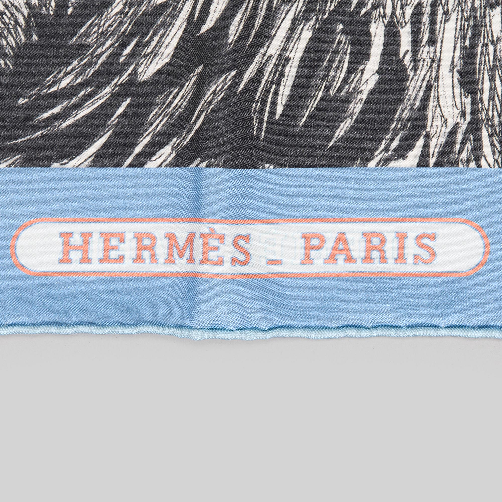 Hermès, a 'Tigre Royal Double Face' silk scarf.