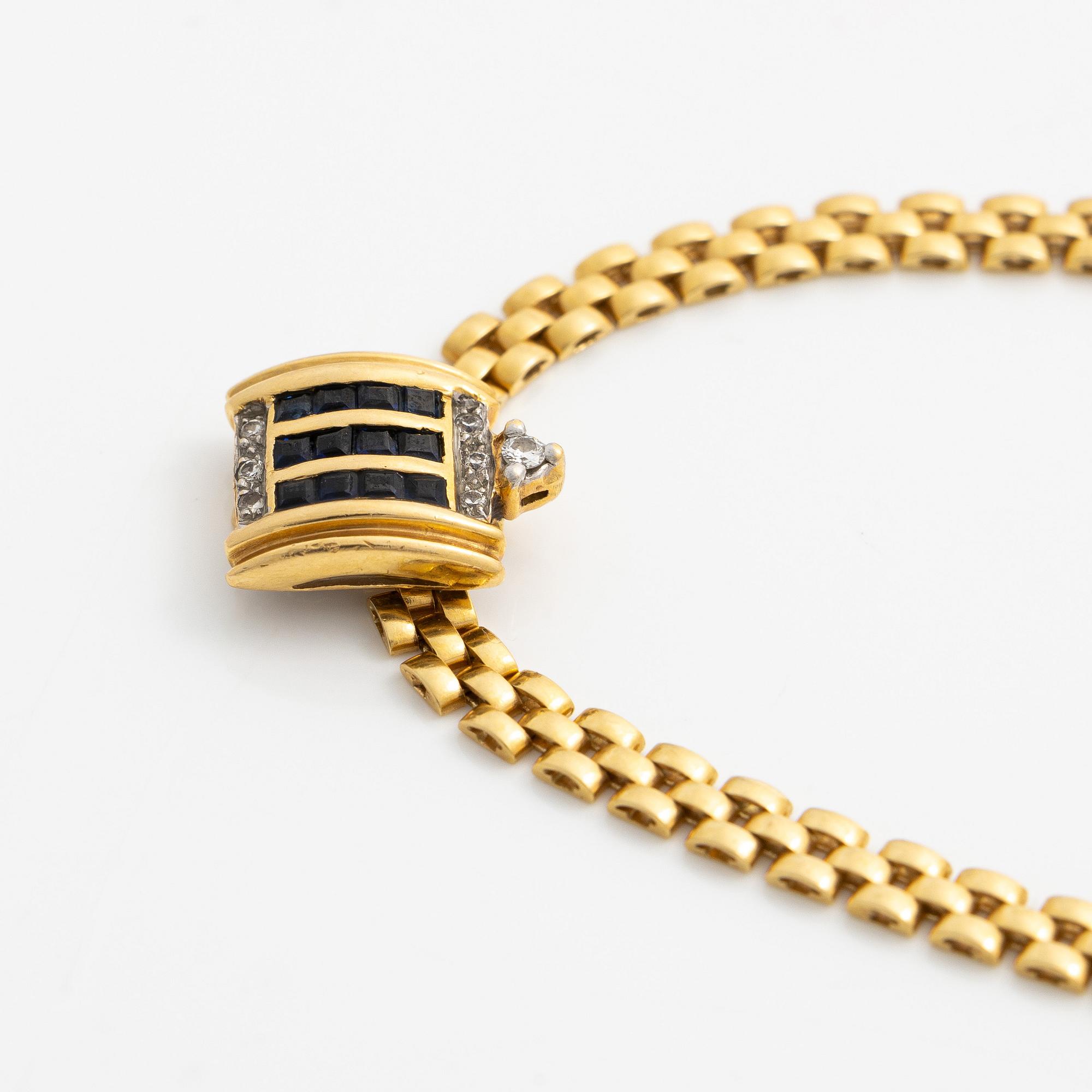Collier 18K guld med avtagbart hänge 18K guld med små diamanter och blå stenar sannolikt safirer.