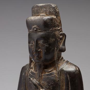 A bronze sculpture of a daoist dignitary, Ming dynasty (1368-1644).