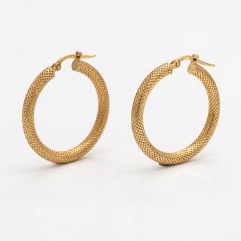 A pair of 18K gold earrings. Italy.