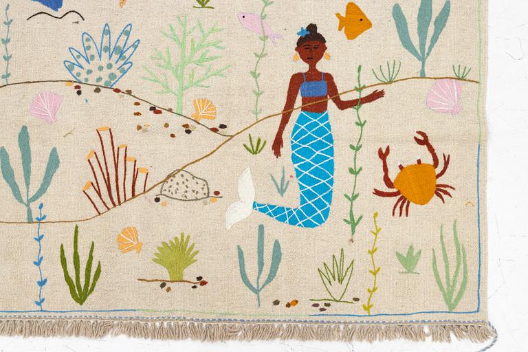 A hand-embroidered Kelim rug, 185 x 122 cm.