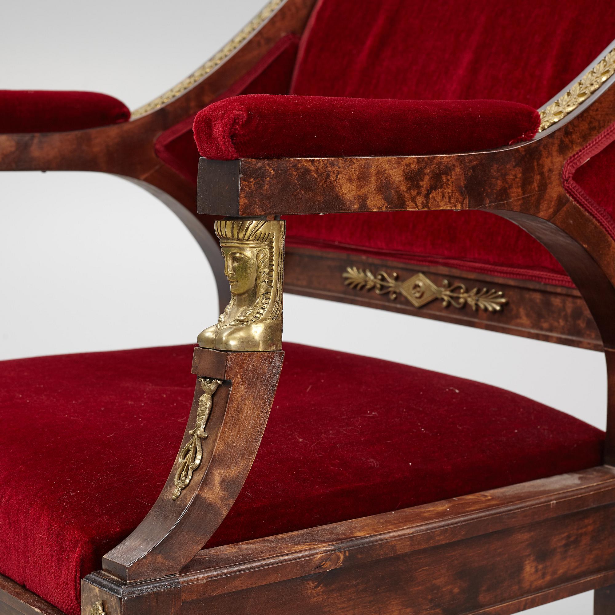 A pair of Empire style armchairs, first half of the 20th century.
