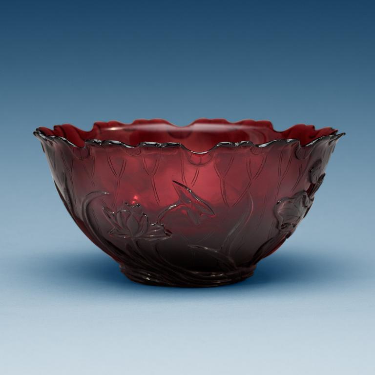 An amethyst coloured and finely cut glass bowl with lotus flowers, late Qing dynasty (1644-1912).