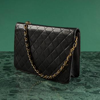 A handbag by Chanel.