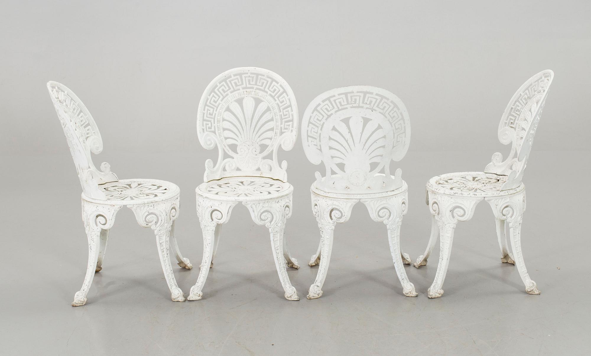 A SET OF FOUR GARDEN CHAIRS AND A GARDEN TABLE, second half of 20th century.