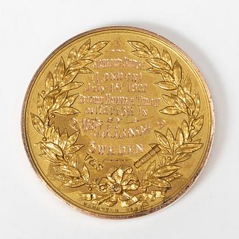 A medal, 15K gold, England, 1922.