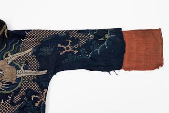A rare fragment of a silk four clawed 'dragon' jacket, late Ming dynasty/early Qing dynasty.
