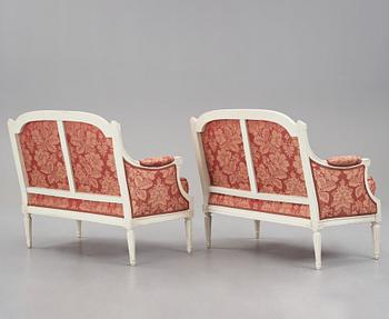 A pair of Louis XVI late 18th Century armchairs by M. dela Porte (Paris 1765-1784).