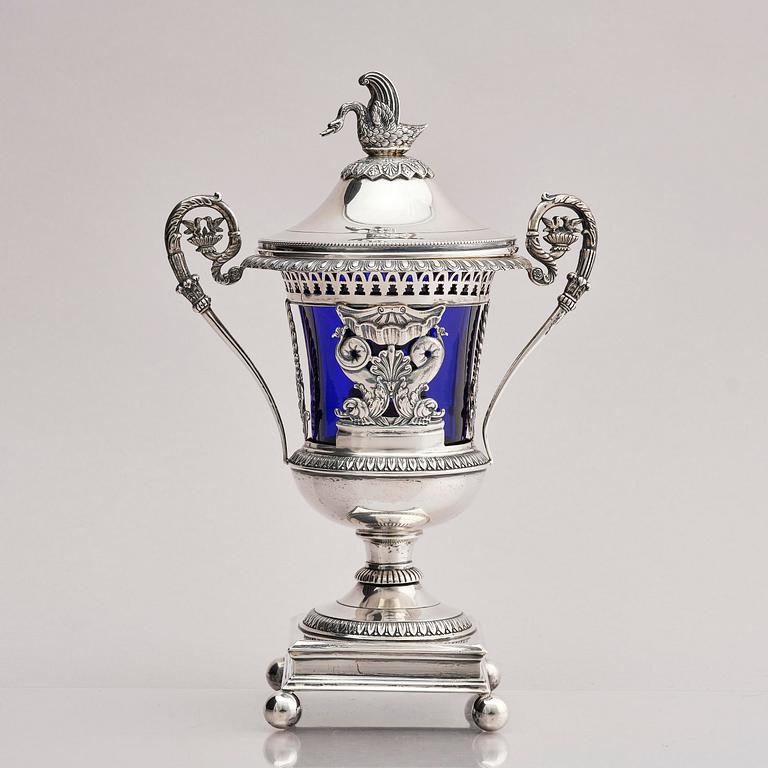 Lockurna, silver med blå glasinsats, Frankrike 1800-talets början.