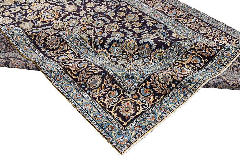 A Keshan carpet, c. 350 x 250 cm.