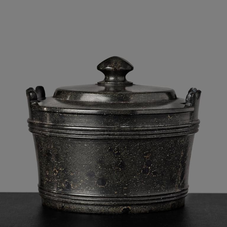 A serpentine stone butter box and cover circa 1800.
