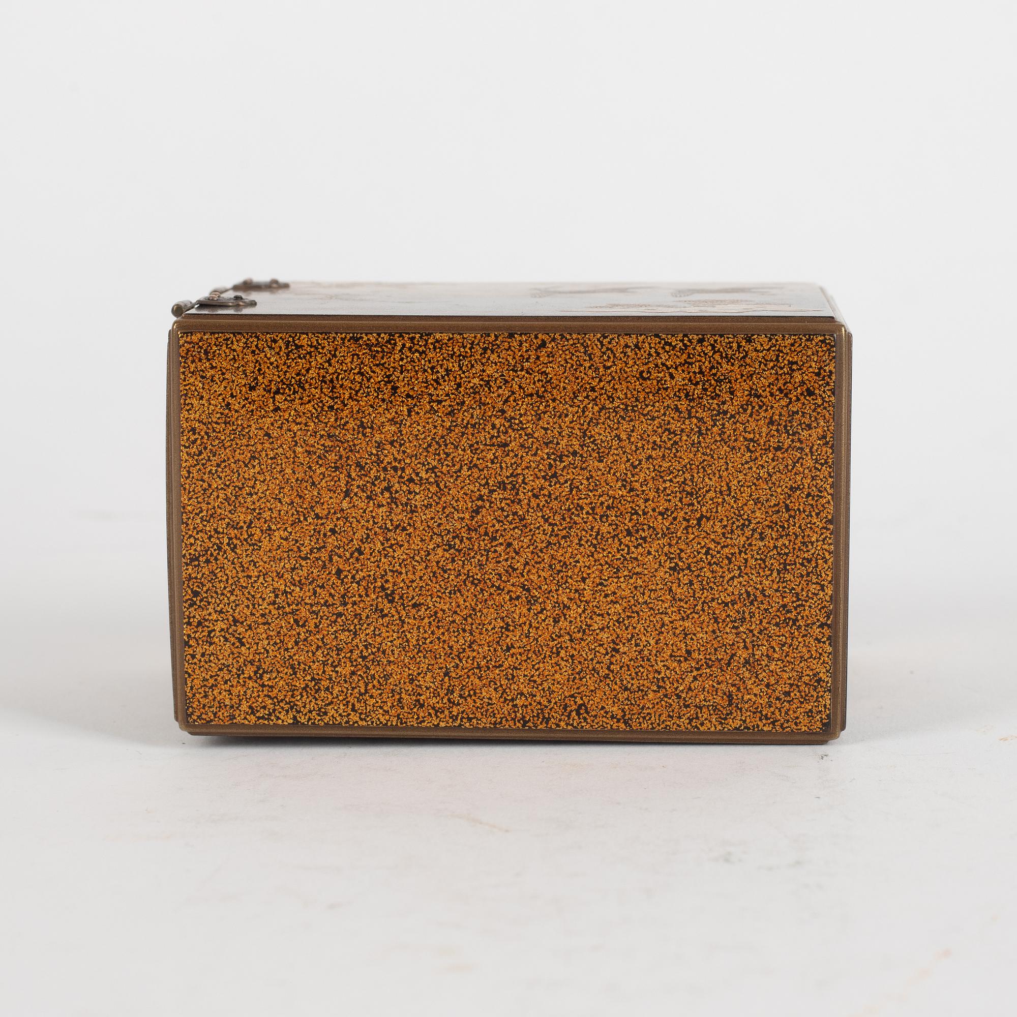 A Japanese lacquer box with three small drawers. Meiji.