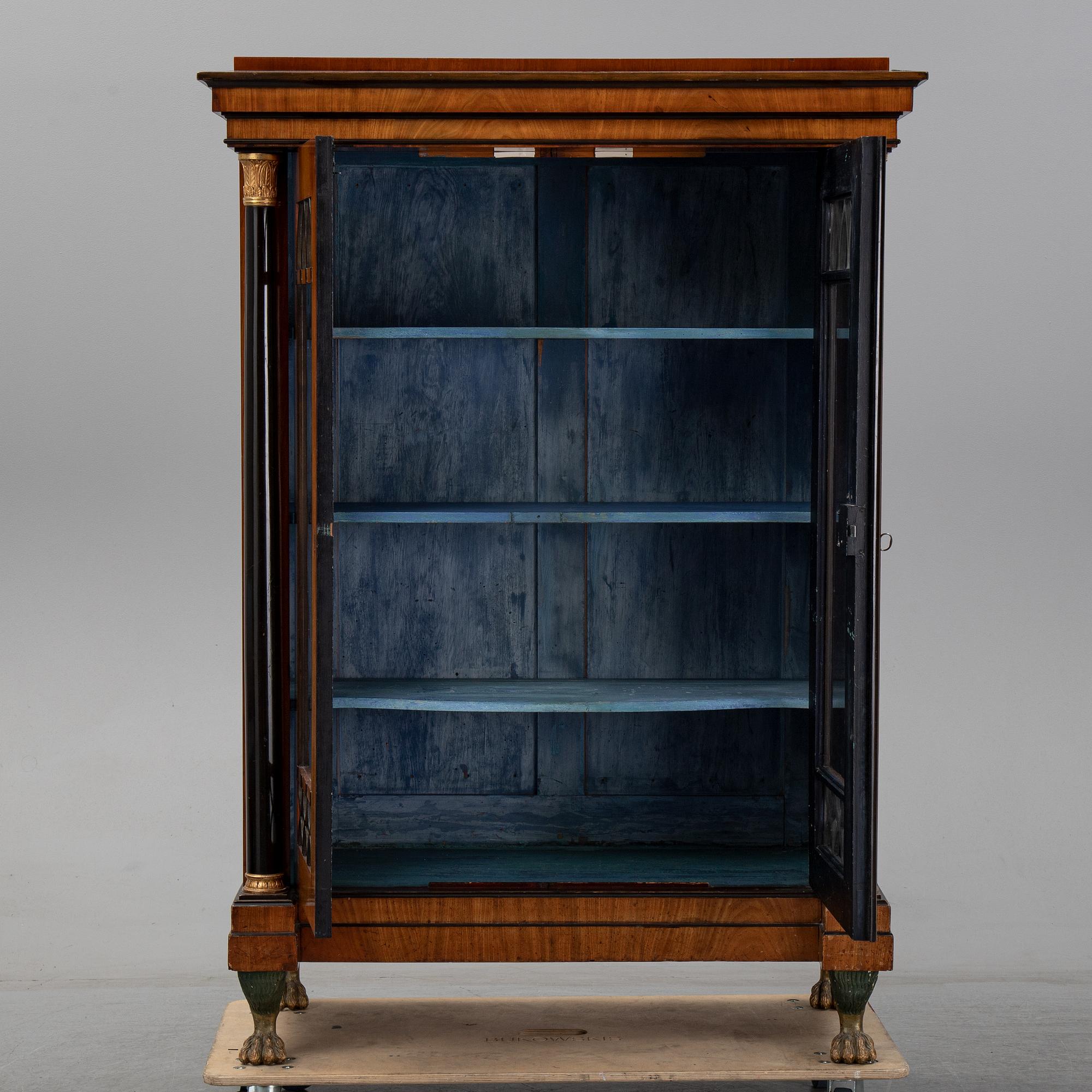 An Empire mahogany cabinet, first half of the 19th Century.