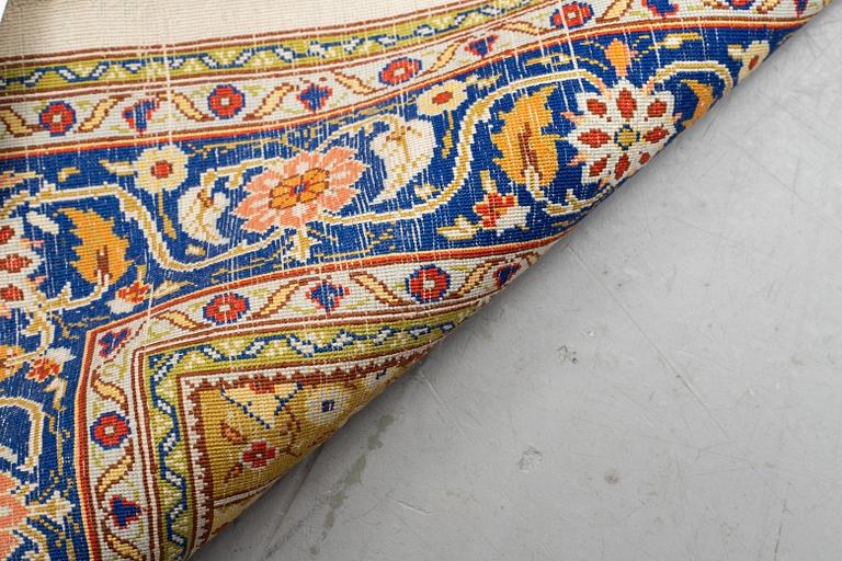 A rug, old Hereke, silke, ca 119 x 71 cm.