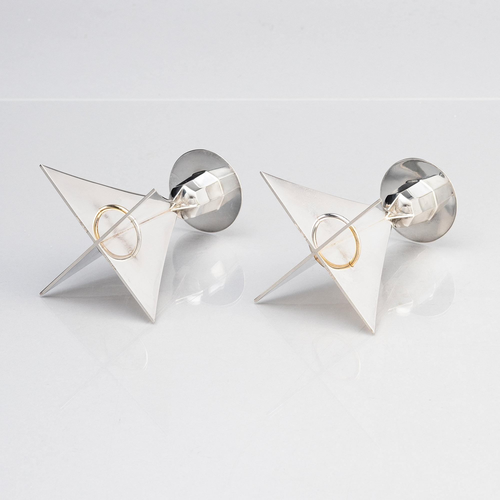 Hubert Hydman, a pair of sterling silver candlesticks, Stockholm 2000.